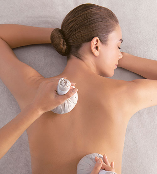 Relaxing Massage With Warm Sand Pouches
